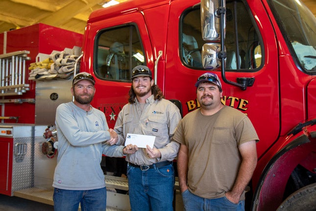 CVEC employee presents donation to Bronte VFD2